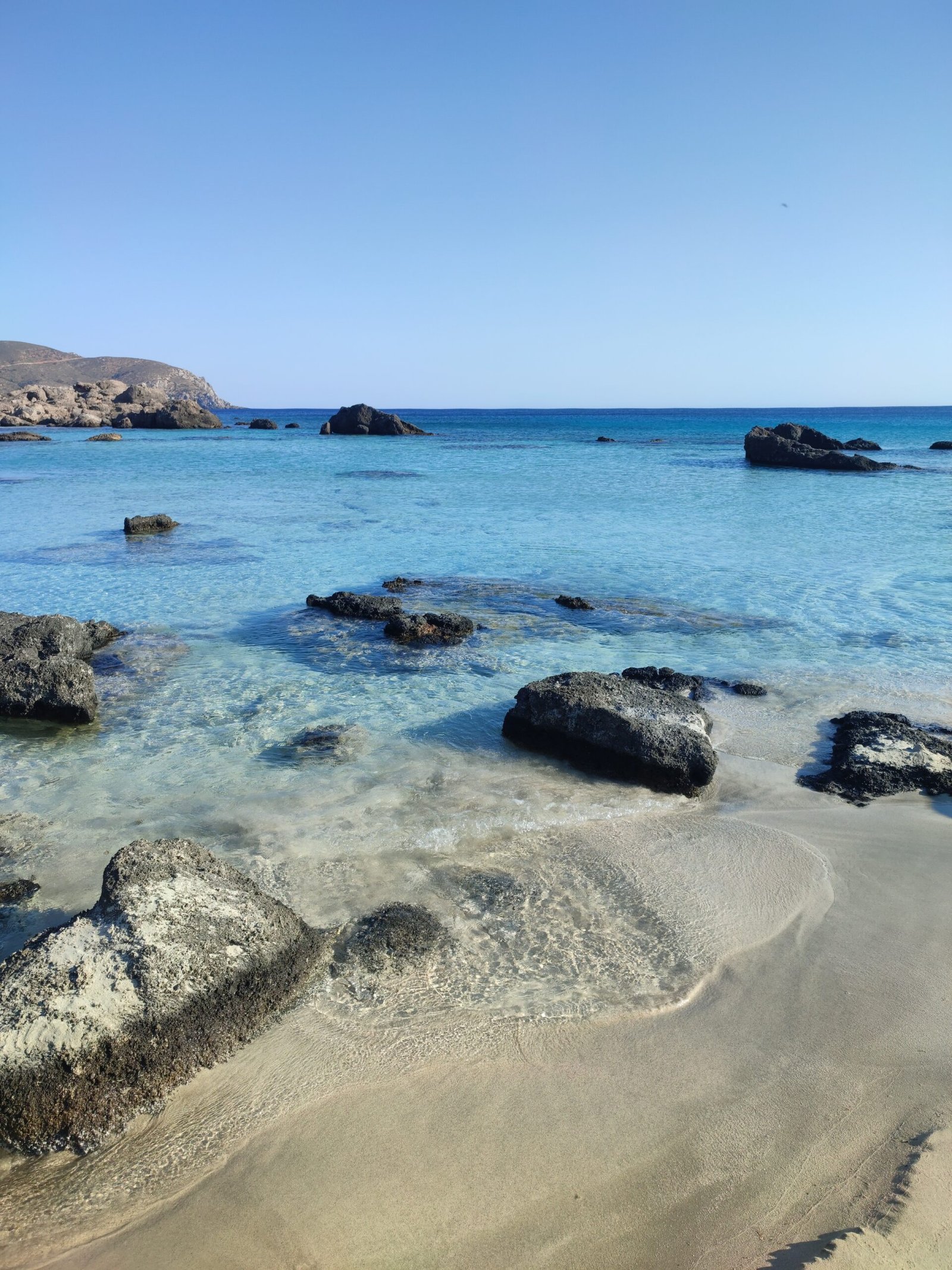 pexels photo 12690889 12690889 scaled Falassarna beach in western Crete with clear shallow water and a rocky shoreline